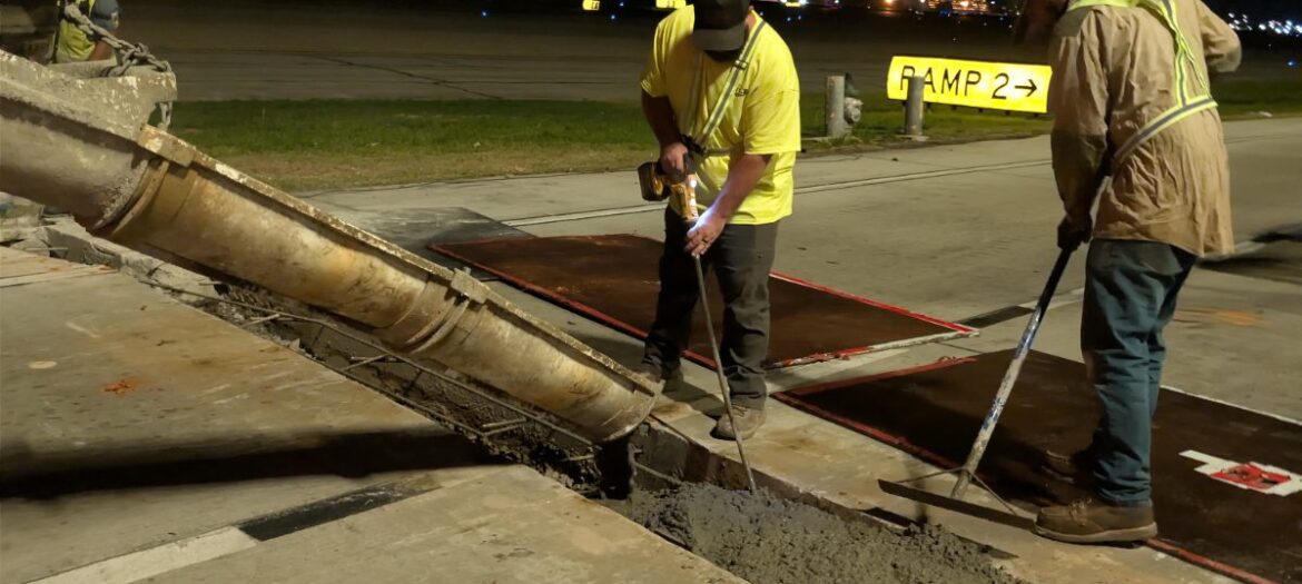Quick Mix Concrete nighttime pour at Hartsfield-Jackson Atlanta International Airport Quick Mix Concrete crew pouring a nighttime concrete repair at Hartsfield-Jackson Atlanta International Airport from the mobile mixer chute